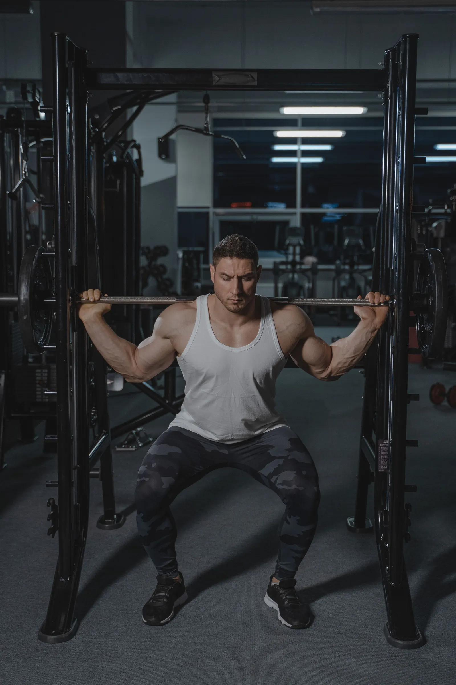 A man squatting with a barbell